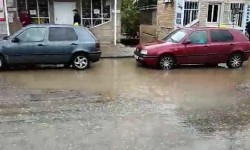 Элдик репортер: жаандан кийин көлмөгө айланган Таш - Көмүрдүн унаа жолдору