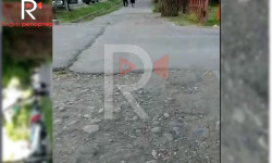 Үмөталиев көчөсүндөгү тамтыгы чыккан тротуар