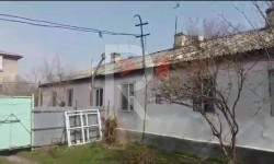 Талашка түшкөн имарат