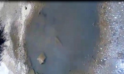 Кемин: кудукка толгон суу көчөнү каптап жатат