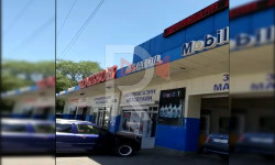 Тротуарды ээлеген май алмаштыруучу жай