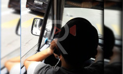 Коомдук транспортту айдап бара жатып телефон менен сүйлөшкөн айдоочу