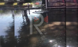 Тротуарды каптаган суу