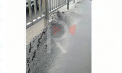 Бишкектин көчөлөрүндөгү ээриген асфальт 