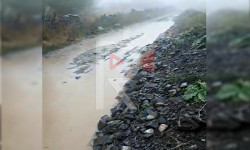 Өзгөрүш: жамгыр жааганда көлчүккө айланган жол