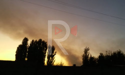 Ак-Бата жаңы конушун каптаган кара түтүн