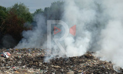 Искра айылын каптаган кара түтүн