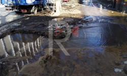 Кара-Балта: көчөнү каптаган суу