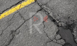 Көпүрөдөгү 4 ай мурун куюлган асфальт жарака кетти