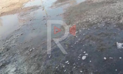 Искра: канализациянын саркынды суусу көчөнү каптап жатат